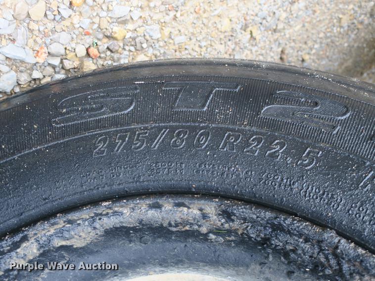 image for item DB8786 1999 International 4700 seal coat truck