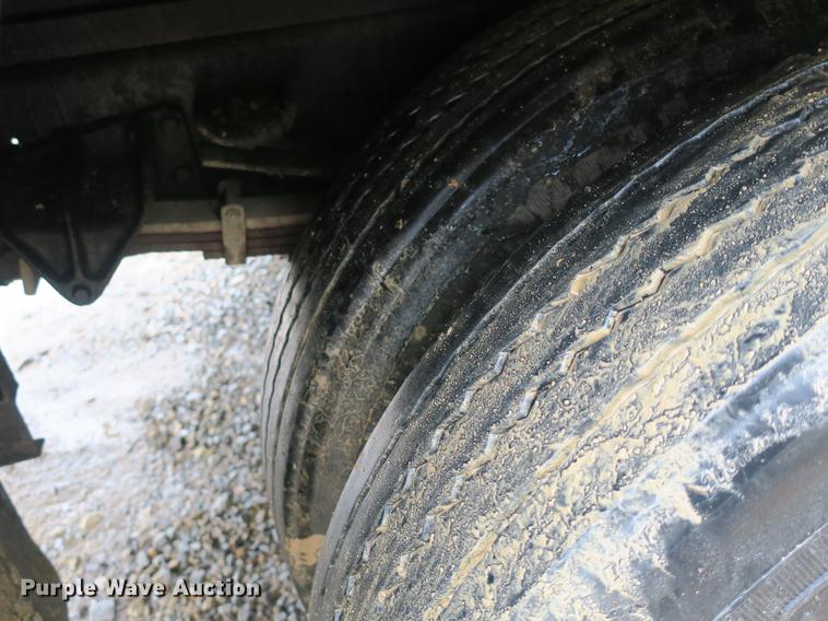 image for item DB8786 1999 International 4700 seal coat truck