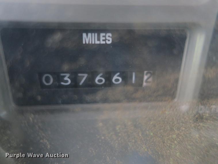 image for item DB8786 1999 International 4700 seal coat truck