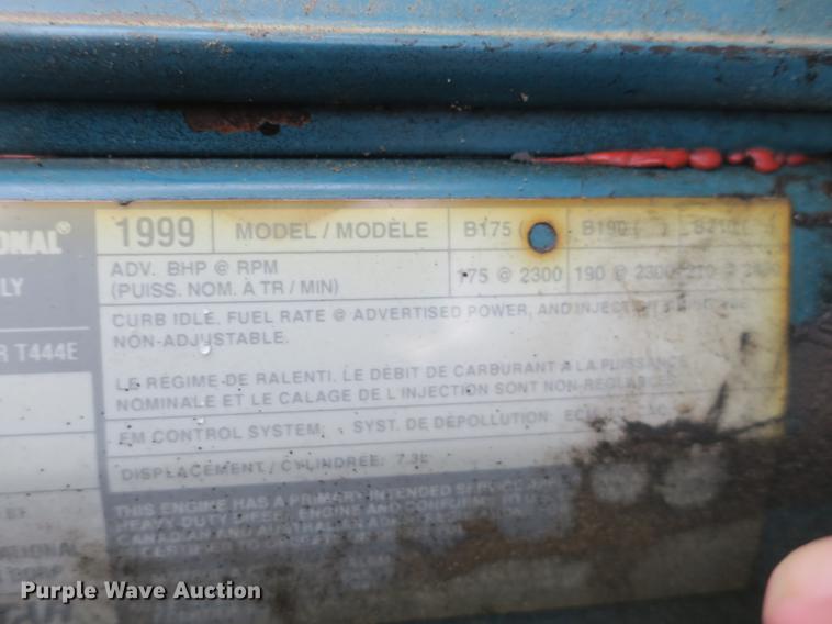 image for item DB8786 1999 International 4700 seal coat truck