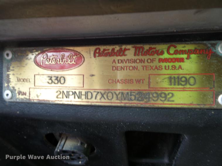 image for item DD2265 2000 Peterbilt 330 flatbed truck