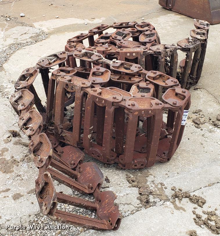 image for item DD4114 Bobcat skid steer over tire tracks