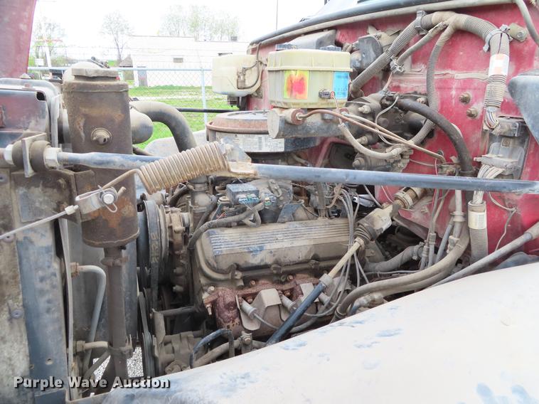 image for item DE3413 1996 GMC TopKick C5500 roll off container truck