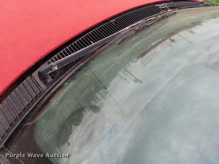 image for item DE3413 1996 GMC TopKick C5500 roll off container truck