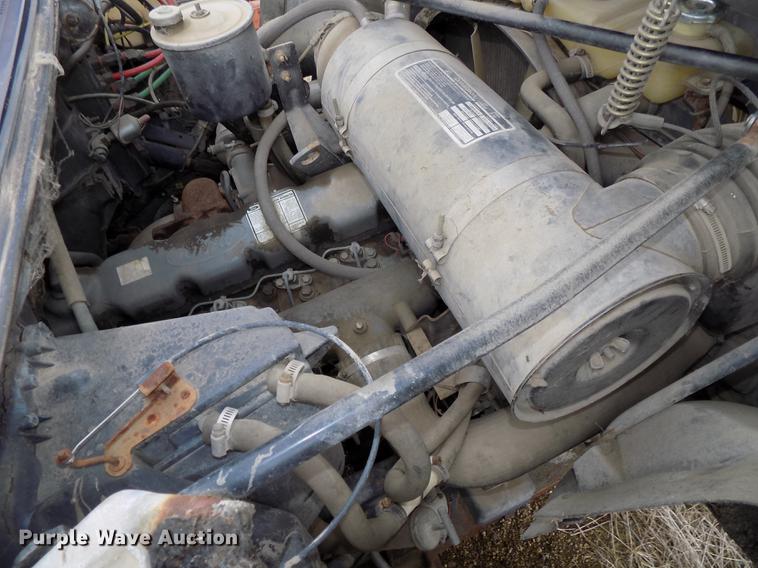 image for item DE7647 1990 Ford FT900 vacuum truck