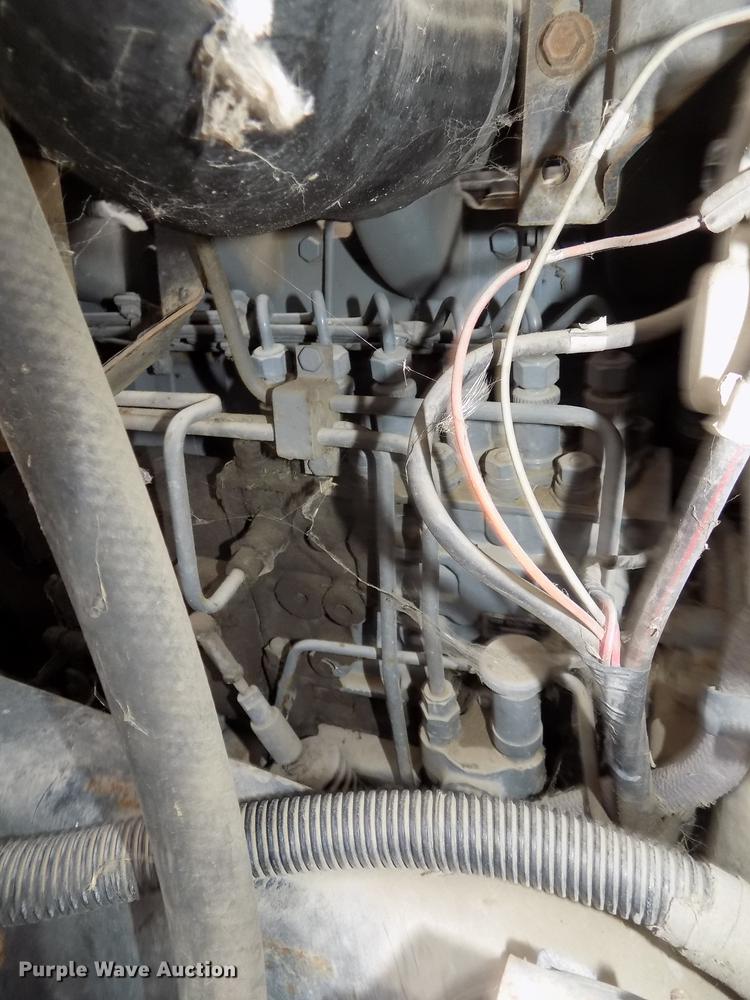 image for item DE7647 1990 Ford FT900 vacuum truck