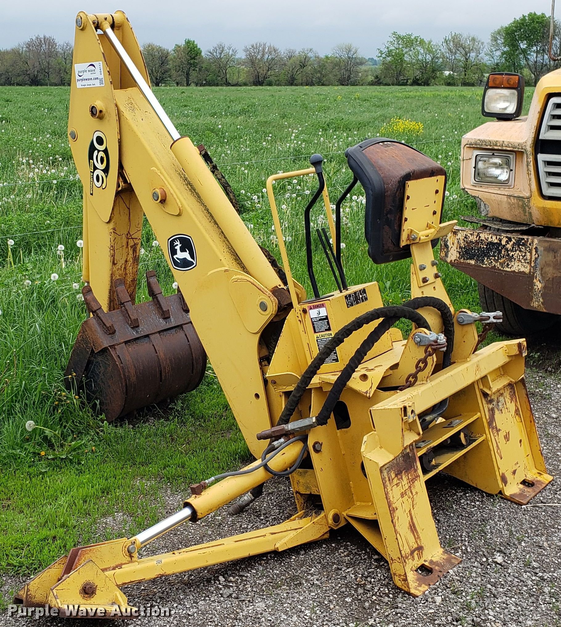 John Deere 960 backhoe attachment in Raymore, MO Item DD4117 sold