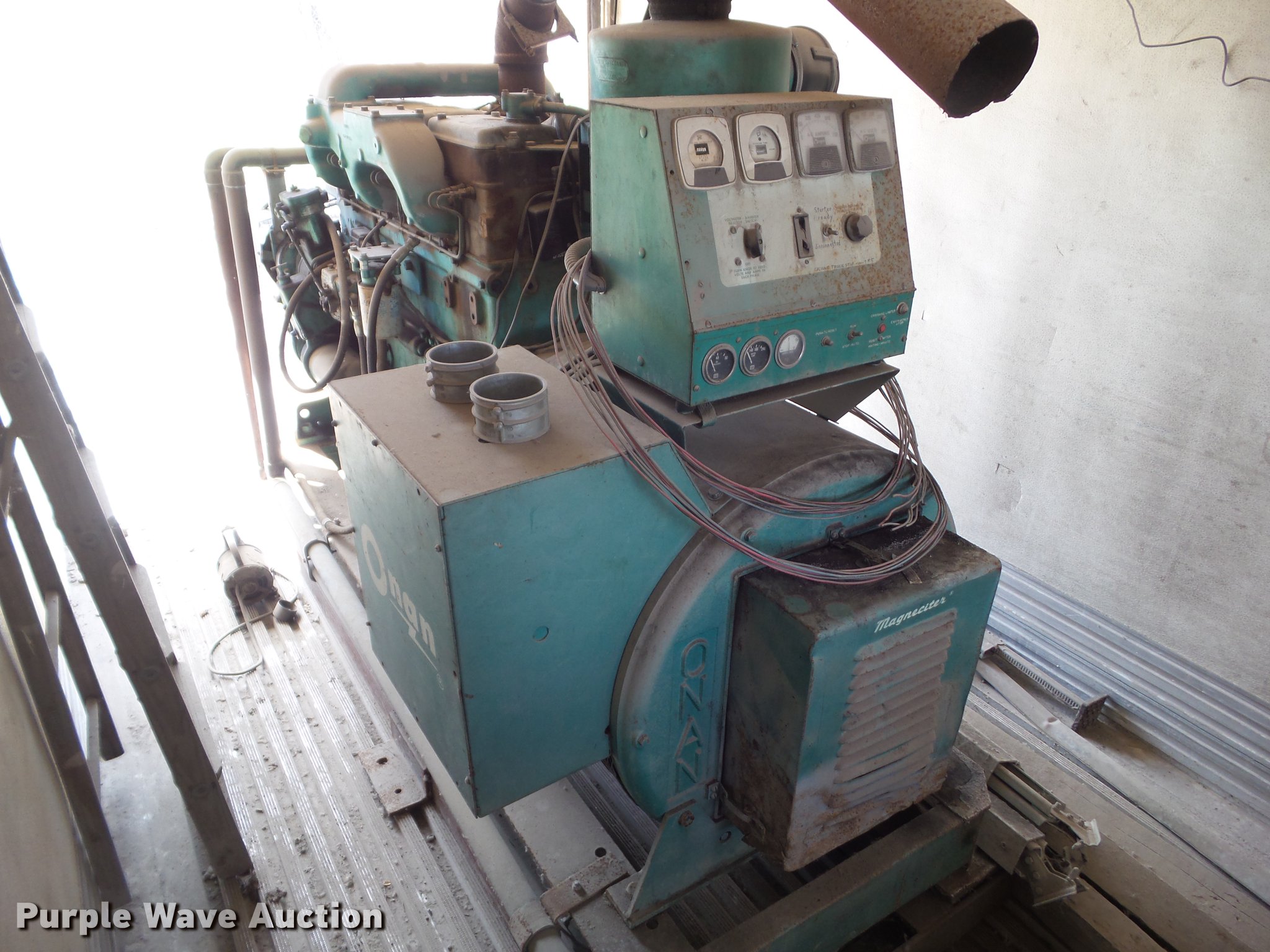 Onan 1750FE generator in Des Moines, IA Item EM9159 sold Purple Wave