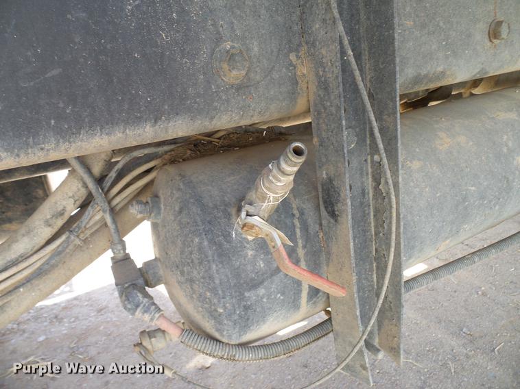 image for item DD6022 1999 International 9100 vertical feed mixer truck