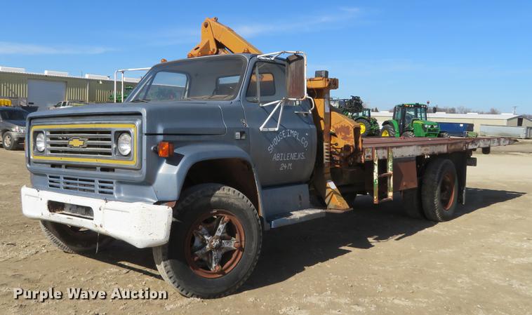 image for item DD6917 1985 Chevrolet C70 flatbed truck with crane
