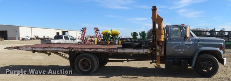 image for item DD6917 1985 Chevrolet C70 flatbed truck with crane