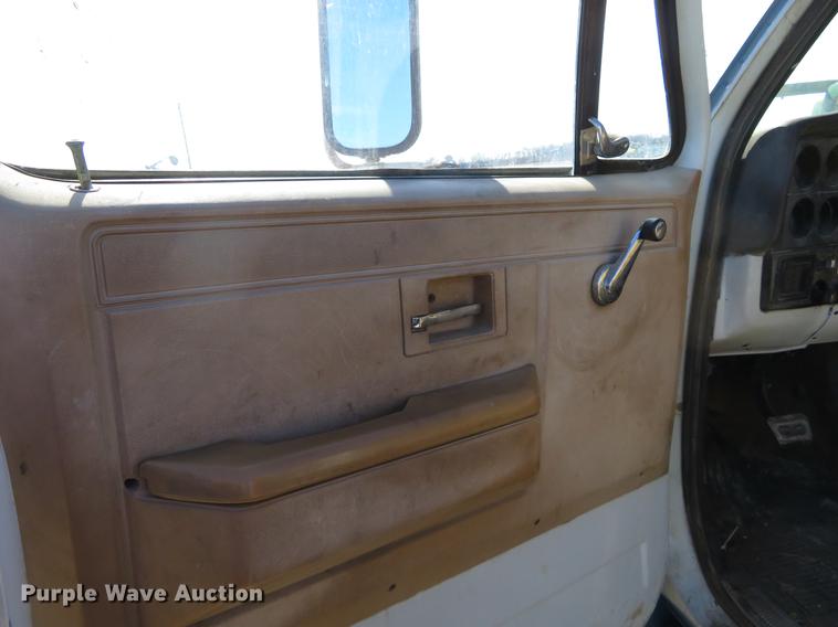 image for item DD6917 1985 Chevrolet C70 flatbed truck with crane