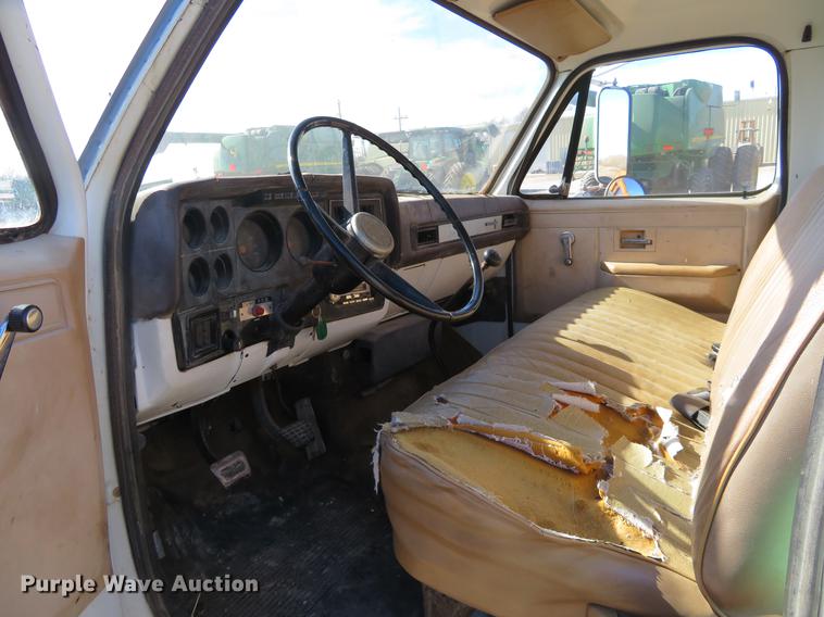 image for item DD6917 1985 Chevrolet C70 flatbed truck with crane