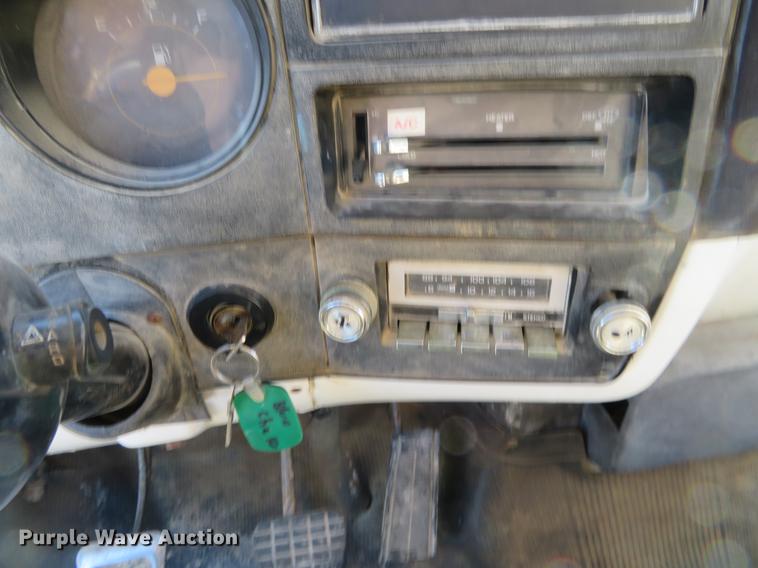 image for item DD6917 1985 Chevrolet C70 flatbed truck with crane