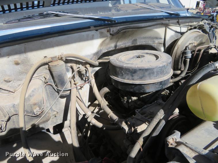 image for item DD6917 1985 Chevrolet C70 flatbed truck with crane