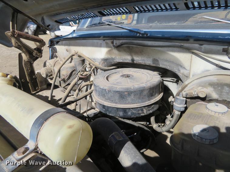 image for item DD6917 1985 Chevrolet C70 flatbed truck with crane