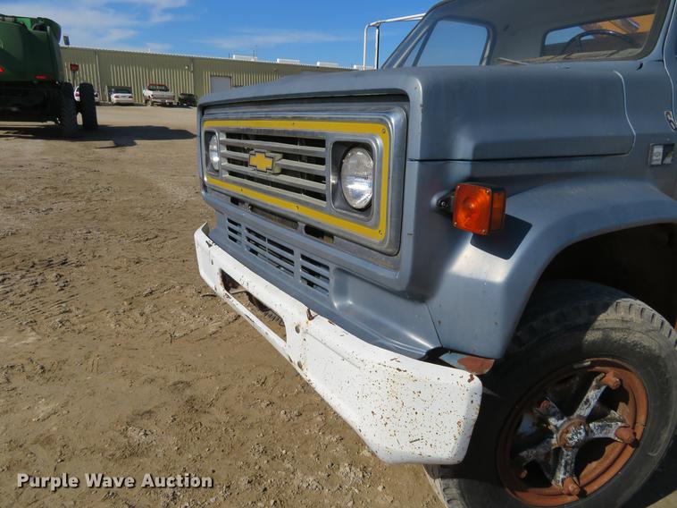 image for item DD6917 1985 Chevrolet C70 flatbed truck with crane