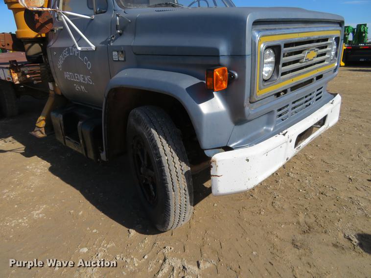 image for item DD6917 1985 Chevrolet C70 flatbed truck with crane