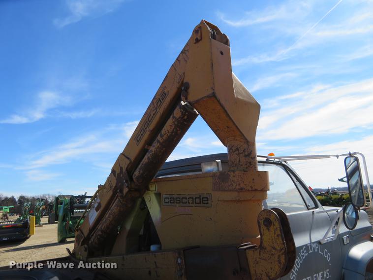 image for item DD6917 1985 Chevrolet C70 flatbed truck with crane