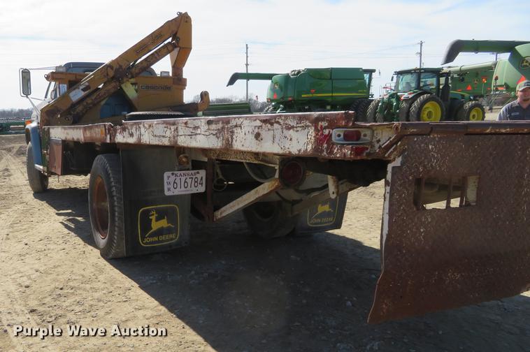 image for item DD6917 1985 Chevrolet C70 flatbed truck with crane