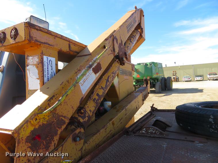 image for item DD6917 1985 Chevrolet C70 flatbed truck with crane