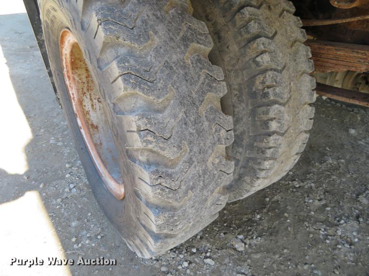 image for item DD6917 1985 Chevrolet C70 flatbed truck with crane