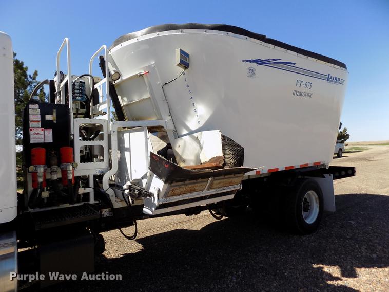 image for item DE1147 2014 Kenworth T440 vertical feed mixer truck