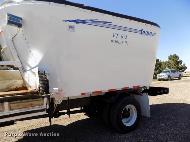 image for item DE1147 2014 Kenworth T440 vertical feed mixer truck