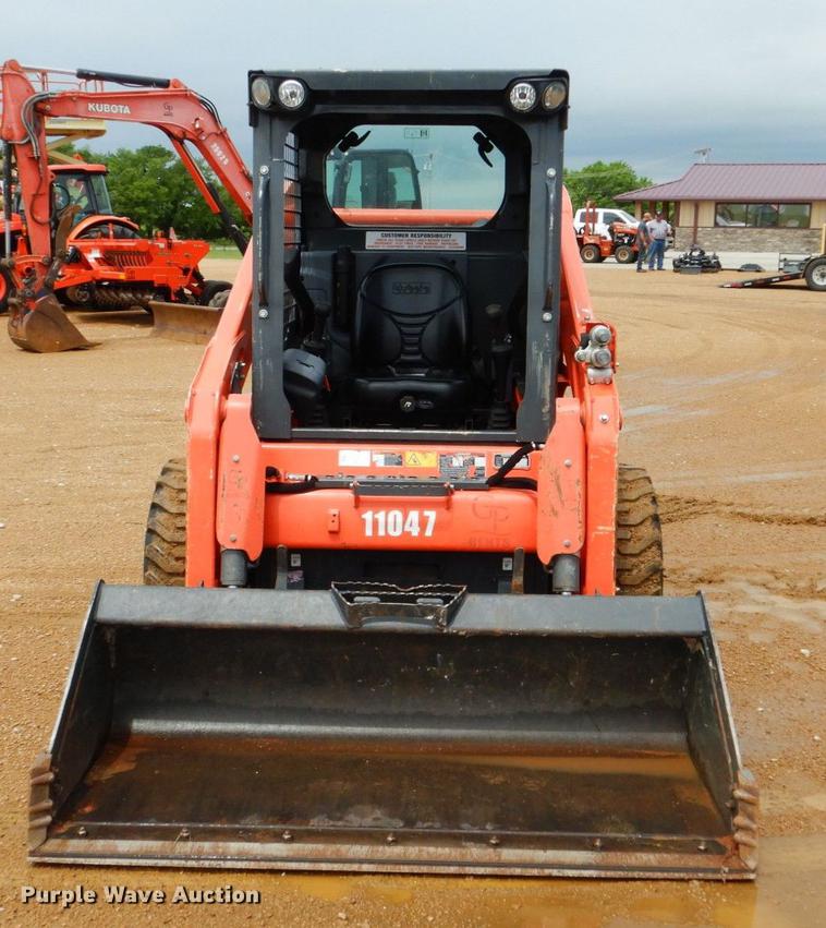 image for item DE3947 2016 Kubota SSV65 skid steer