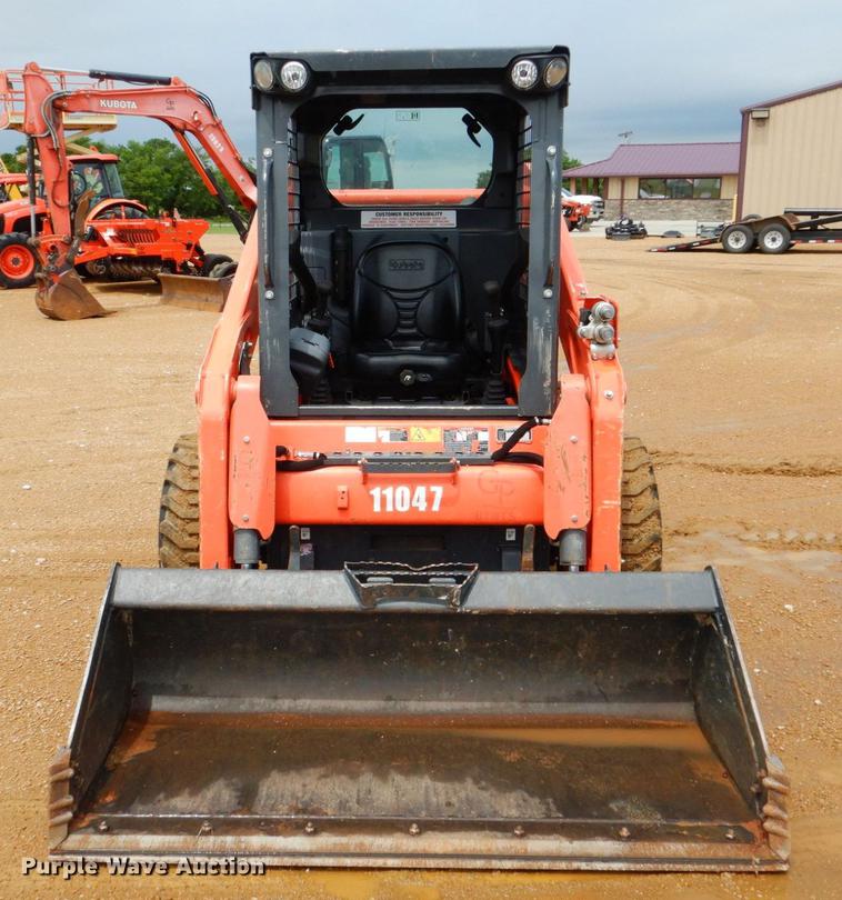 image for item DE3947 2016 Kubota SSV65 skid steer