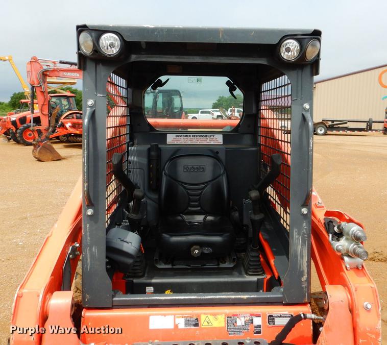 image for item DE3947 2016 Kubota SSV65 skid steer