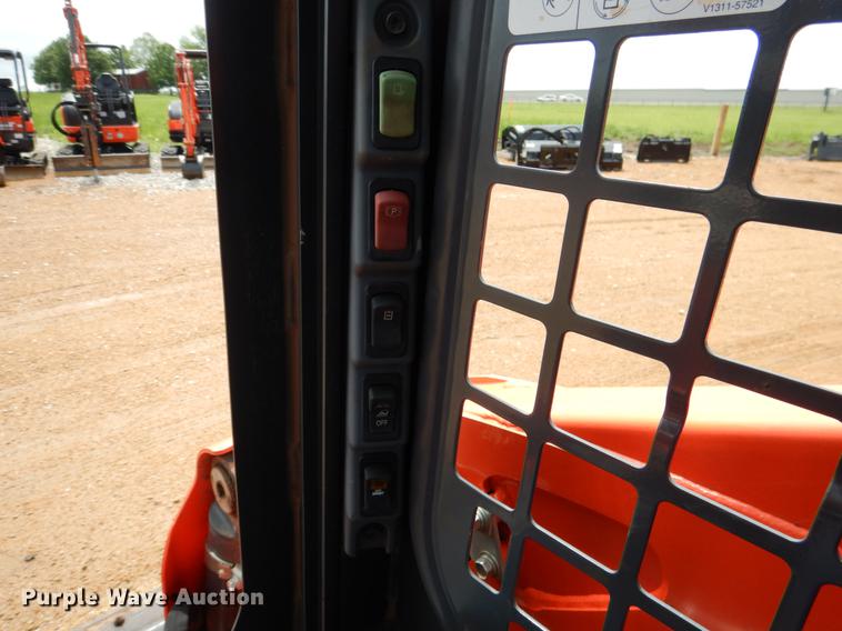 image for item DE3947 2016 Kubota SSV65 skid steer