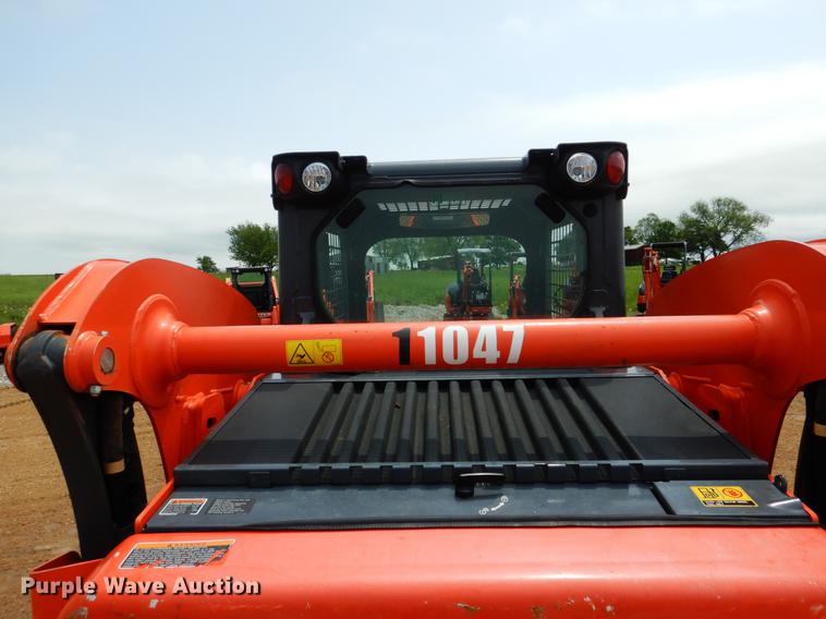image for item DE3947 2016 Kubota SSV65 skid steer