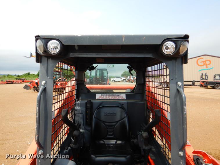 image for item DE3947 2016 Kubota SSV65 skid steer