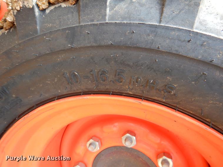 image for item DE3947 2016 Kubota SSV65 skid steer