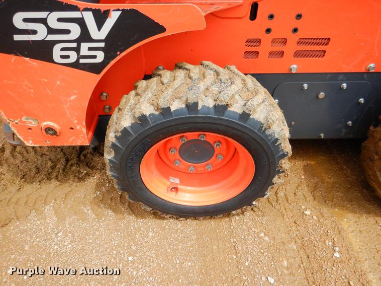 image for item DE3947 2016 Kubota SSV65 skid steer