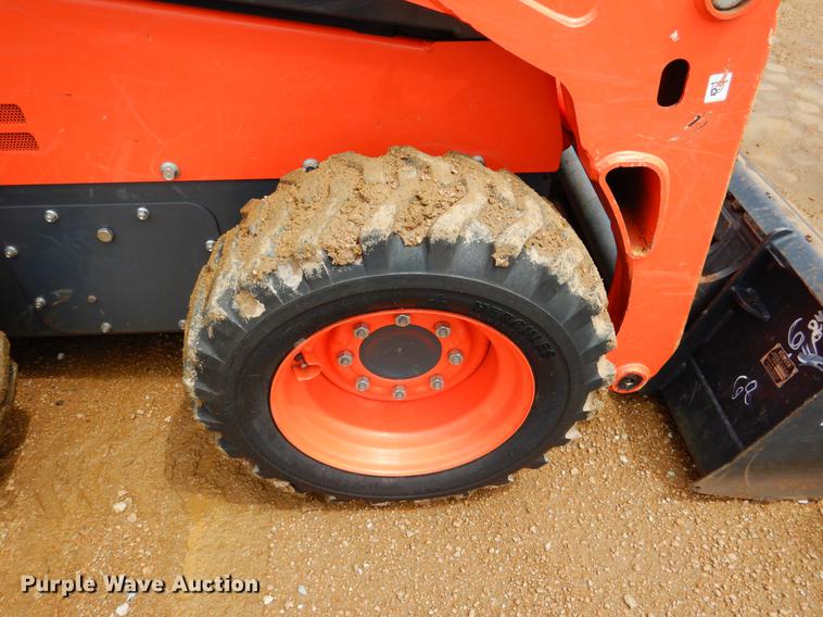 image for item DE3947 2016 Kubota SSV65 skid steer