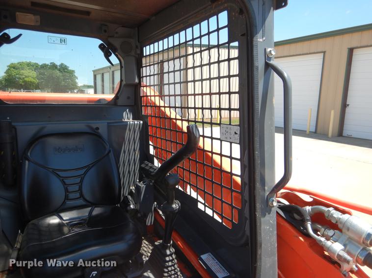 image for item DE3960 2016 Kubota SSV65 skid steer