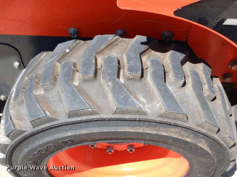 image for item DE3960 2016 Kubota SSV65 skid steer