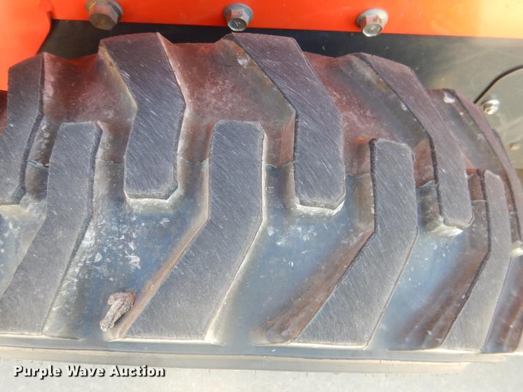 image for item DE3960 2016 Kubota SSV65 skid steer