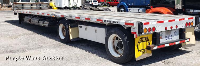 image for item EN9925 2012 Transcraft DTL211 drop deck trailer