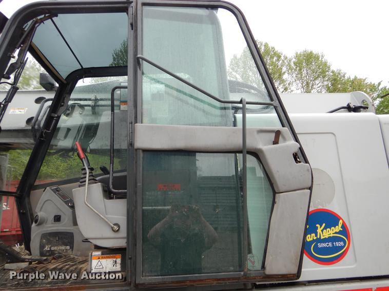 image for item DE8368 2009 Gradall XL3100 Series III rubber tire excavator