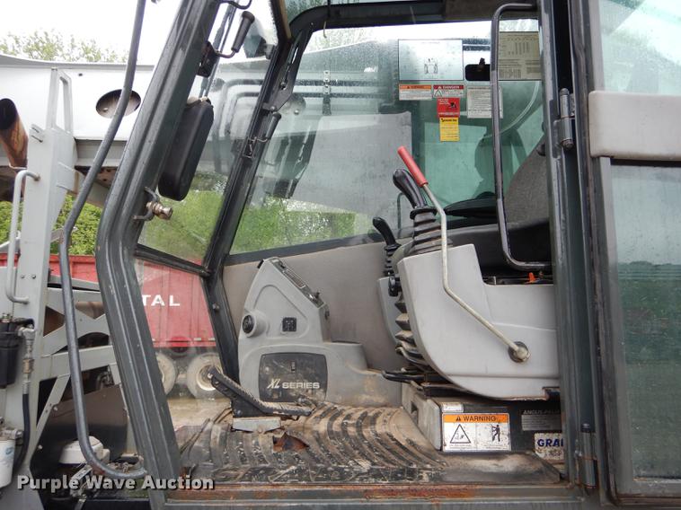 image for item DE8368 2009 Gradall XL3100 Series III rubber tire excavator