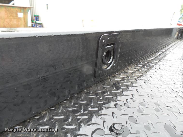 image for item DE7792 2004 Ford F350 Super Duty Crew Cab flatbed pickup truck