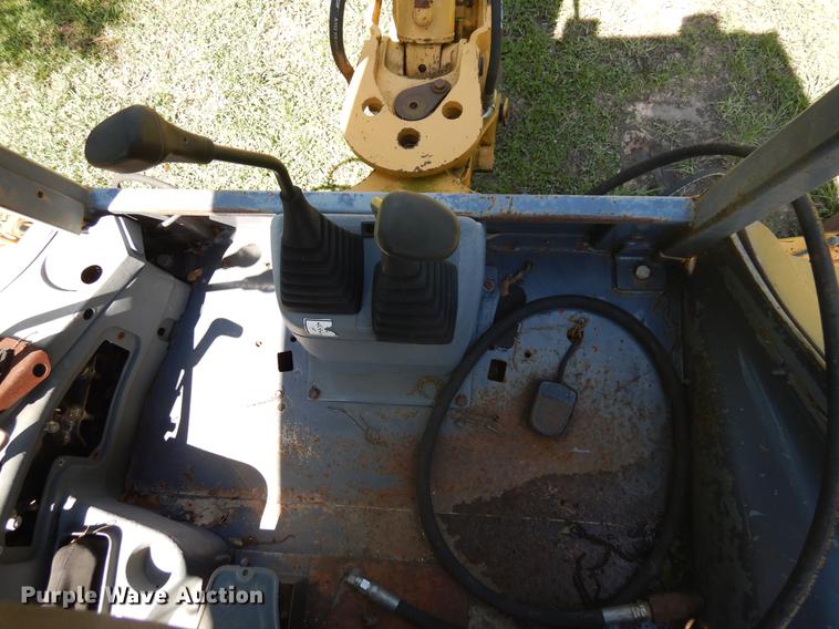 image for item DD3004 1999 New Holland 575E backhoe