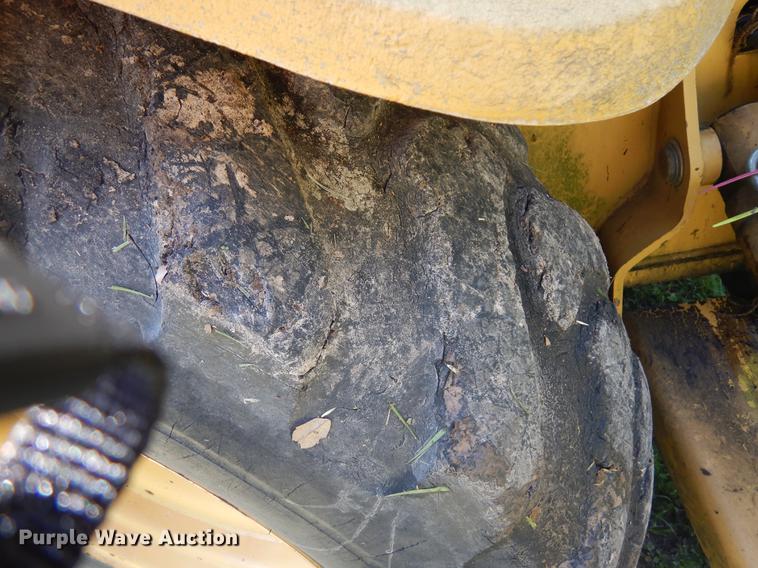 image for item DD3004 1999 New Holland 575E backhoe