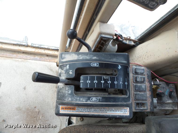 image for item DE7777 1995 Caterpillar 140H motor grader