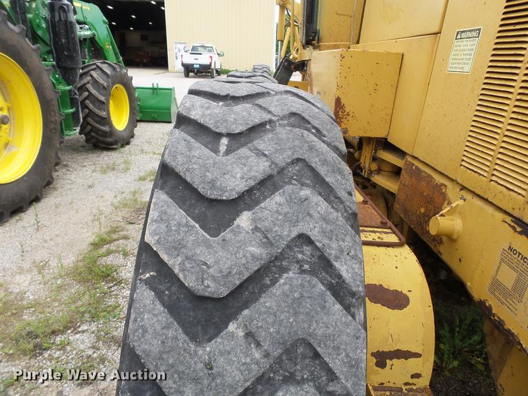 image for item DE7777 1995 Caterpillar 140H motor grader