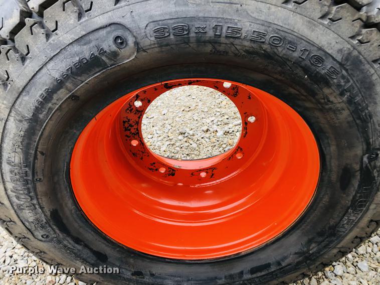 image for item DF6592 Bobcat 33x15.50-16.5 tires and wheels