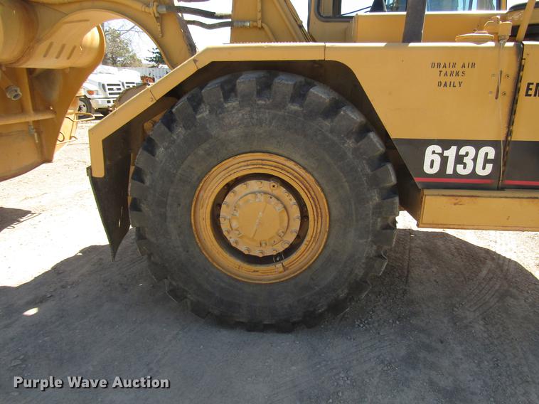 image for item DF7966 1996 Caterpillar 613C Series II water wagon